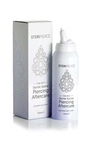 SteriPierce piercing aftercare spray in action, releasing a fine mist with open cap and box in background